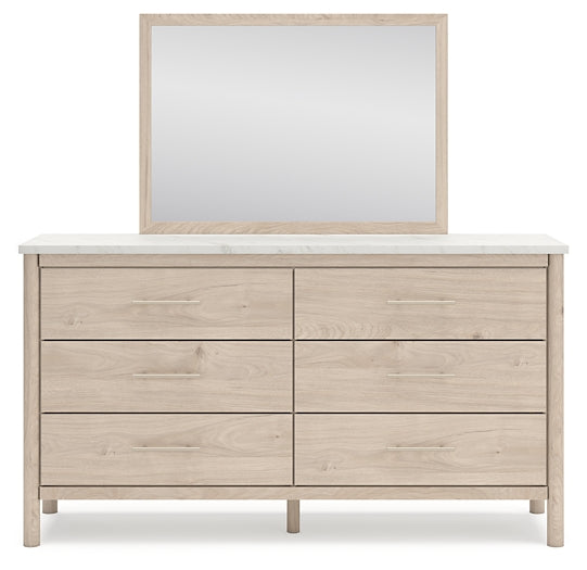 Cadmori Queen Upholstered Panel Bed with Mirrored Dresser